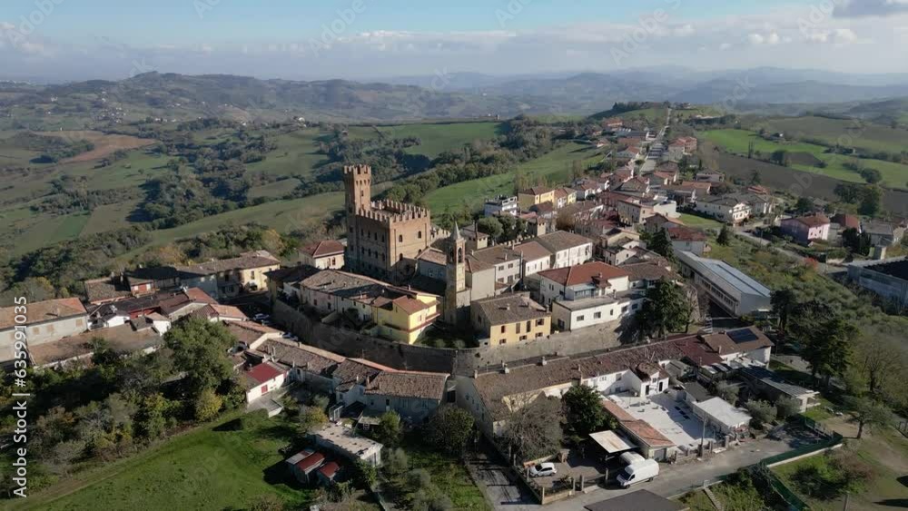 High-angle view of the medieval village of Tavoleto in the province of Pesaro Urbino Marche. High-angle view of the medieval village of Tavoleto in the province of Pesaro Urbino Marche.