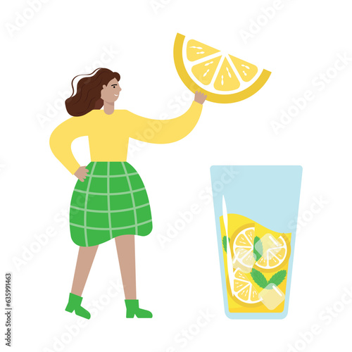 A young woman is holding a huge slice of lemon for a cocktail or lemonade.