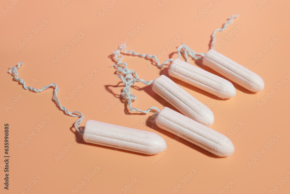 hygienic tampons on a light background, the concept of female care during critical days hygienic tampons on a light background, the concept of female care during critical days