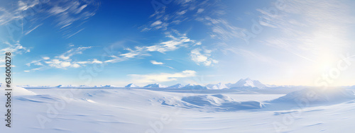 Beautiful Natural Landscape of a Snowfield in a sunny day behind a blue sky with clouds. Generative AI. © Mauricio