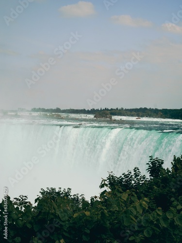 Vertical of Niagara Falls on a sunny day