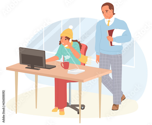 Cold in office scene, employee in hat working on computer