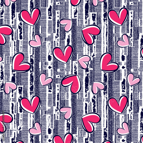 Hearts pattern on denim background