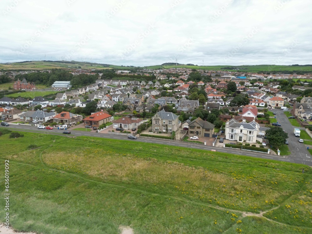 Aerial view of a residential area with lush green grass in Scotland Aerial view of a residential area with lush green grass in Scotland