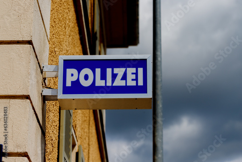 Detailed close-up of the lettering POLIZEI in German on a house. POLIZEI translation Police.