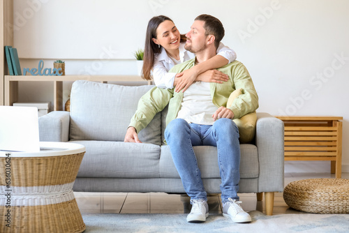 Happy young couple hugging ...