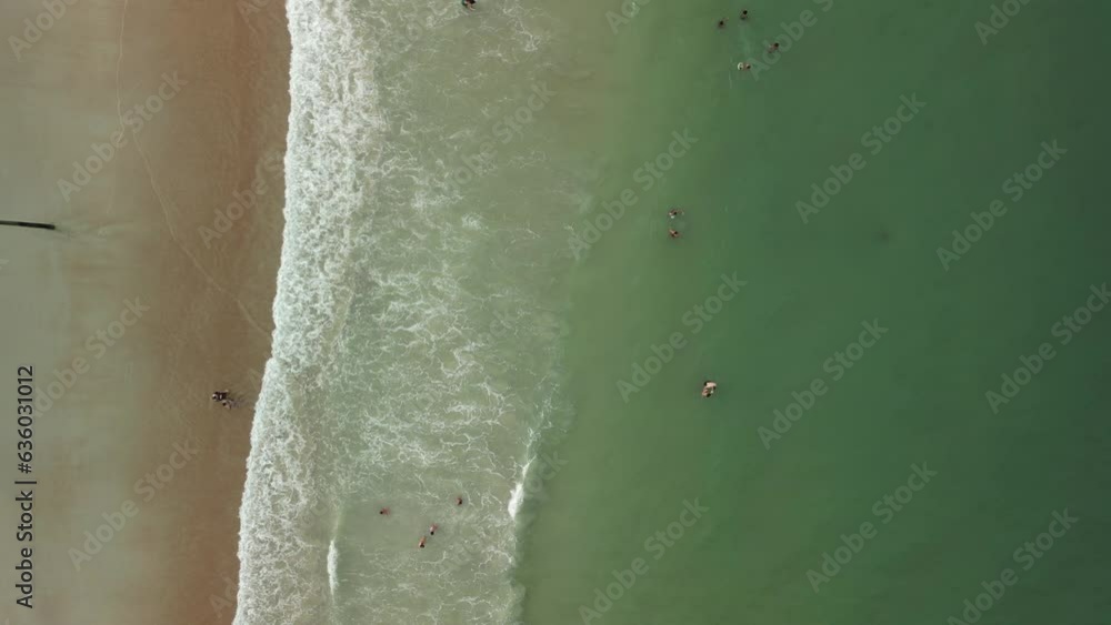 Top down view at the sand and waves Top down view at the sand and waves