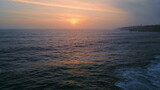 Beautiful sea evening twilight cloudy summer weather. Ocean rippling at sunset