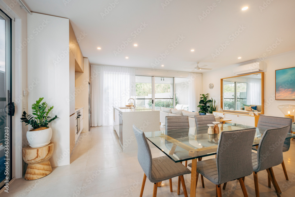 © Image Supply Co/Stocksy - Open plan kitchen and living room inside modern home © Image Supply Co/Stocksy - Open plan kitchen and living room inside modern home