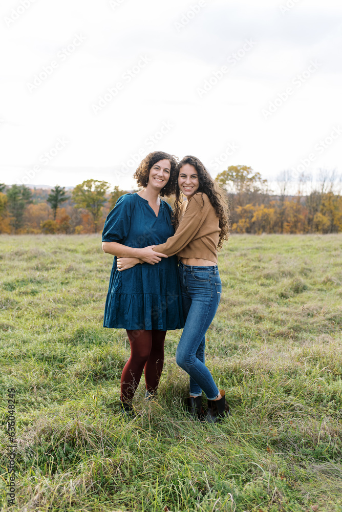 Portrait of a smiling mother and her daughter Portrait of a smiling mother and her daughter