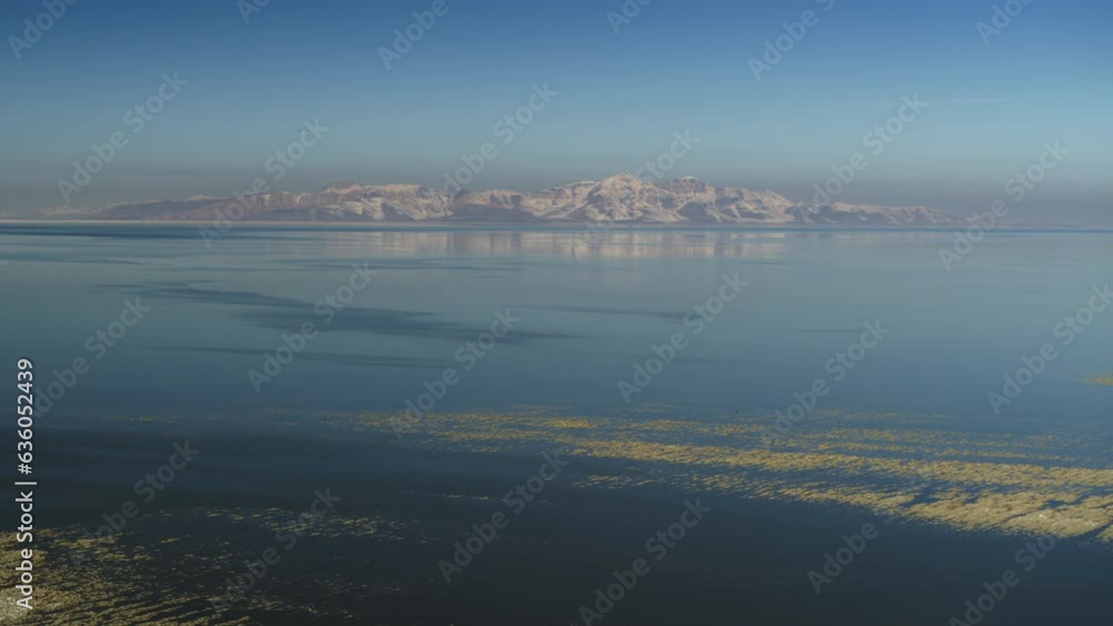 Aerial flyover view of receding water in Great Salt Lake / Magna, Utah, United States Aerial flyover view of receding water in Great Salt Lake / Magna, Utah, United States