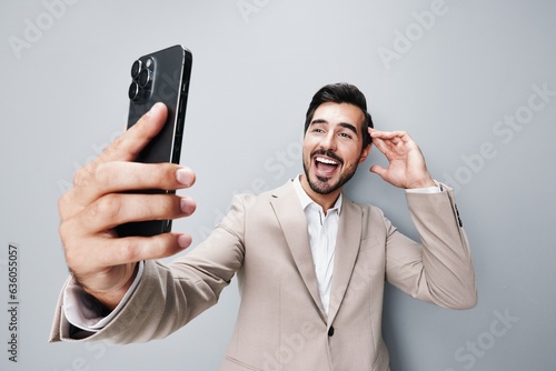 hold man happy smartphone smile business phone portrait suit call corporate