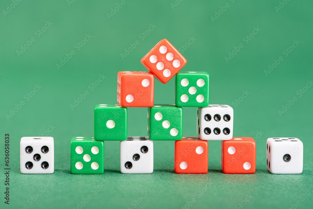 Dice, beautiful dice placed on green felt surface, selective focus. Dice, beautiful dice placed on green felt surface, selective focus.