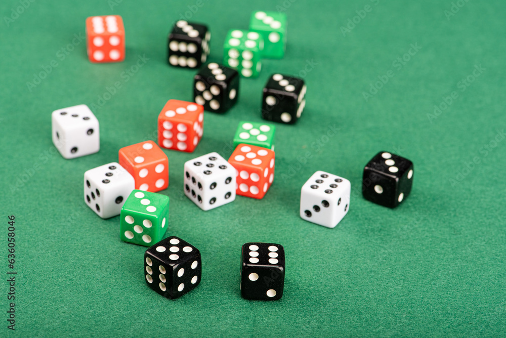 Dice, beautiful dice placed on green felt surface, selective focus. Dice, beautiful dice placed on green felt surface, selective focus.