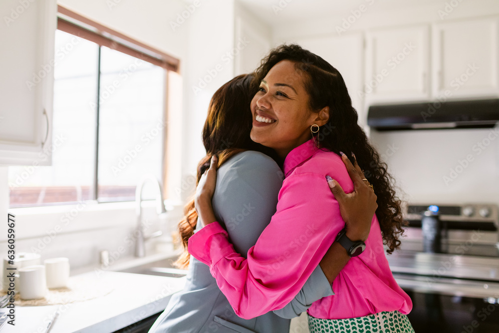 © ByLorena/Stocksy - Adult friend welcoming home © ByLorena/Stocksy - Adult friend welcoming home