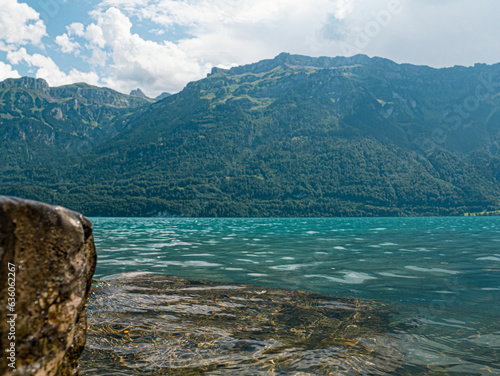 Mountainlake at berner Oberland Brienzersee blue watter high mountain peaks photo