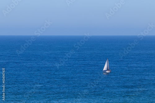 Small Cabin Yacht On Open Blue Ocean © JJ van Ginkel