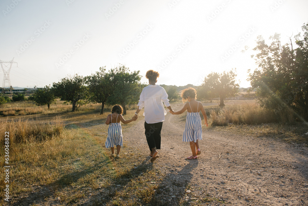 Black Woman With Her Daughter at sunset Black Woman With Her Daughter at sunset