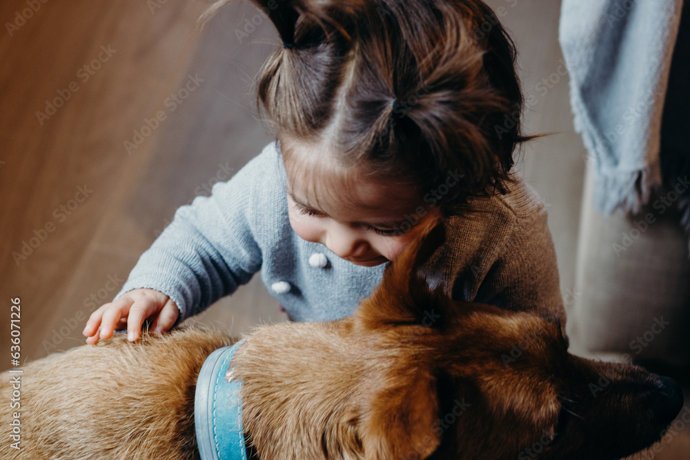 Cute baby girl Hugging Dog Cute baby girl Hugging Dog