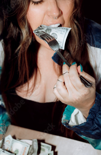 Woman Eating Money  photo