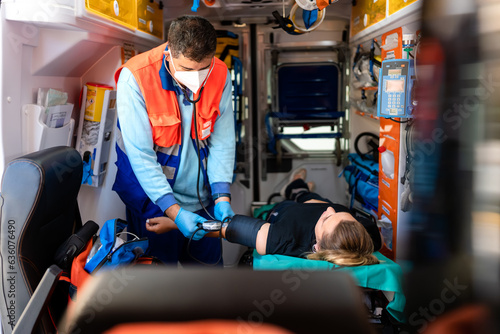 paramedic working on an ambulance photo