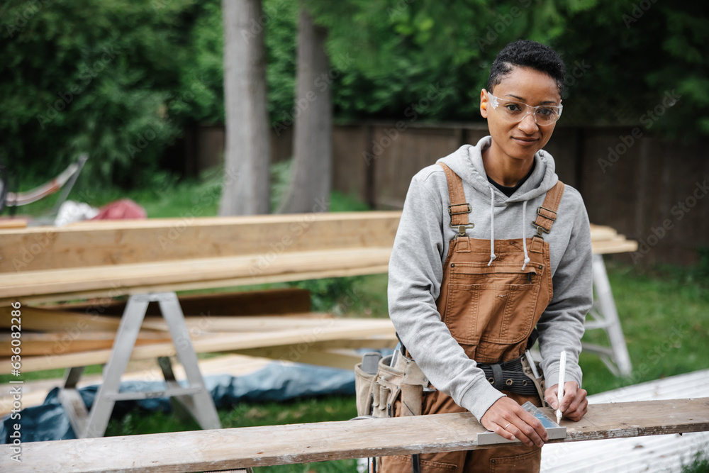 Skilled Carpenter Smiling Portrait on the jobsite. Skilled Carpenter Smiling Portrait on the jobsite.