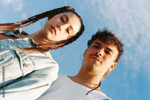 Young and modern couple at sunset photo