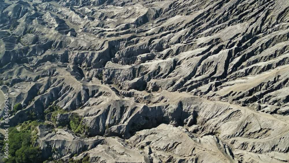 Details of the soil formations of Mount Bromo, an abstract formation looking from abrove - Bromo Volcano, East Java - Indonesia Details of the soil formations of Mount Bromo, an abstract formation looking from abrove - Bromo Volcano, East Java - Indonesia