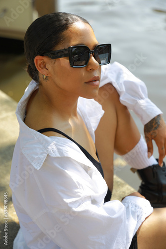 young black female with sunglasses photo