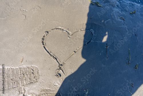 heart in a lake sand photo