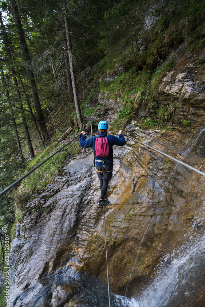 Anonymous Man Crossing Wire Suspension Bridge Anonymous Man Crossing Wire Suspension Bridge