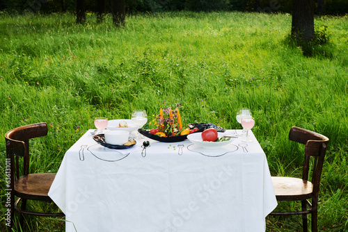 outdoor table with tablecloth photo
