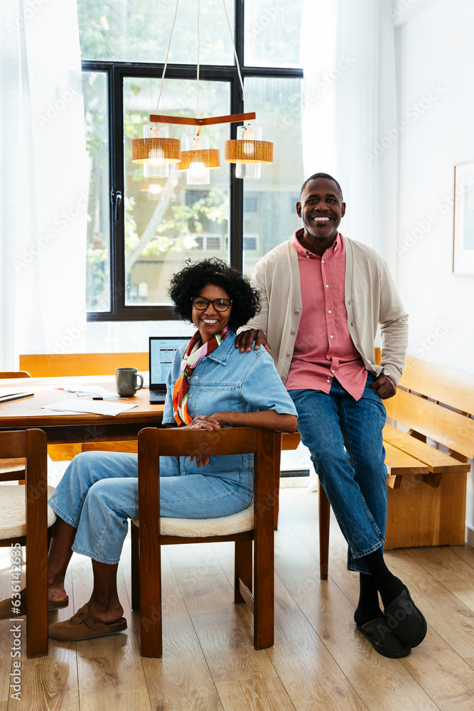 Middle age couple portrait at home office Middle age couple portrait at home office