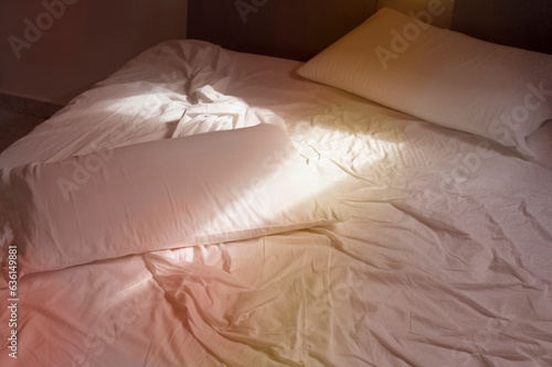 Warm light on the bed photo