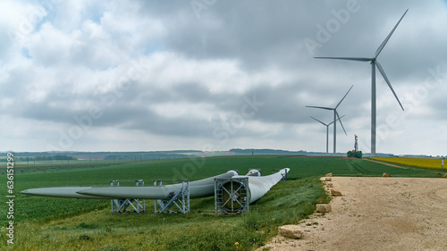 Renewable energy wind turbine blade parts await repair and replacement