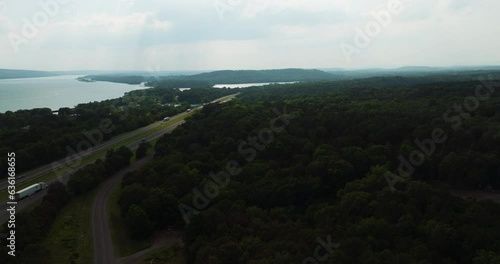 Aerial View Over Lush Dense Vegetation Surrounding Spadra Park In Clarksville, Arkansas, USA - drone shot photo