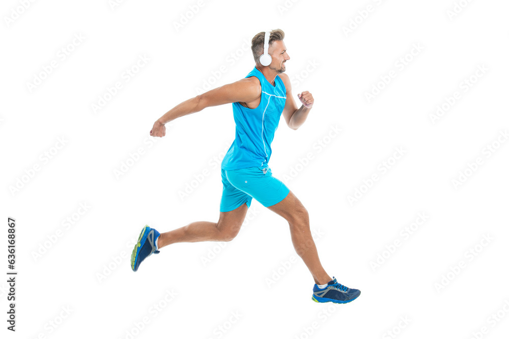 The jogger stretched legs before running. sport jogger listen to music in headphones. The jogger ran at sport training isolated on white. In a morning sport workout jogger run in studio