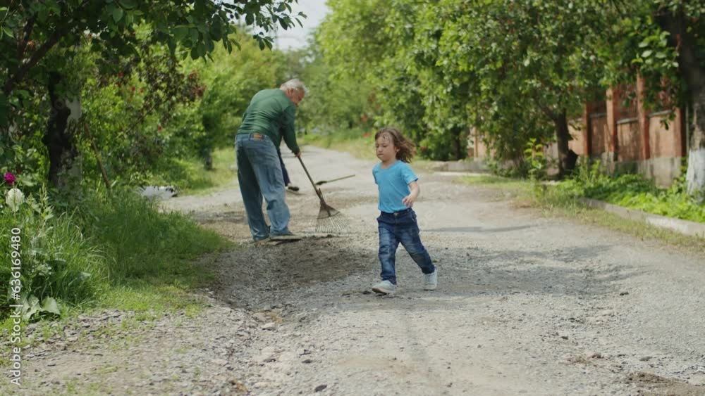 Through the hands of three generations, a house is repaired, and a garden flourishes. The bond between father, son, and grandfather radiates happiness and the joy of working together. Through the hands of three generations, a house is repaired, and a garden flourishes. The bond between father, son, and grandfather radiates happiness and the joy of working together.