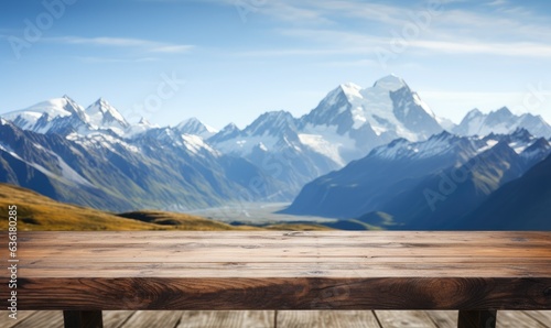 The empty wooden brown table top with mountain background