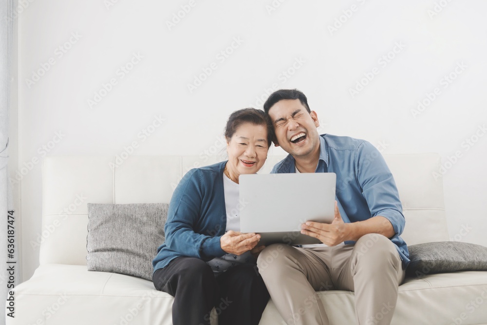 couple using laptop at home couple using laptop at home