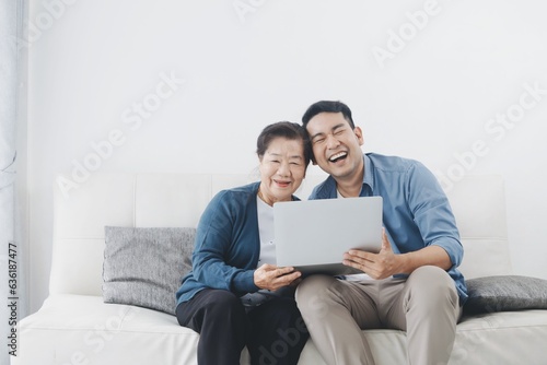 couple using laptop computer