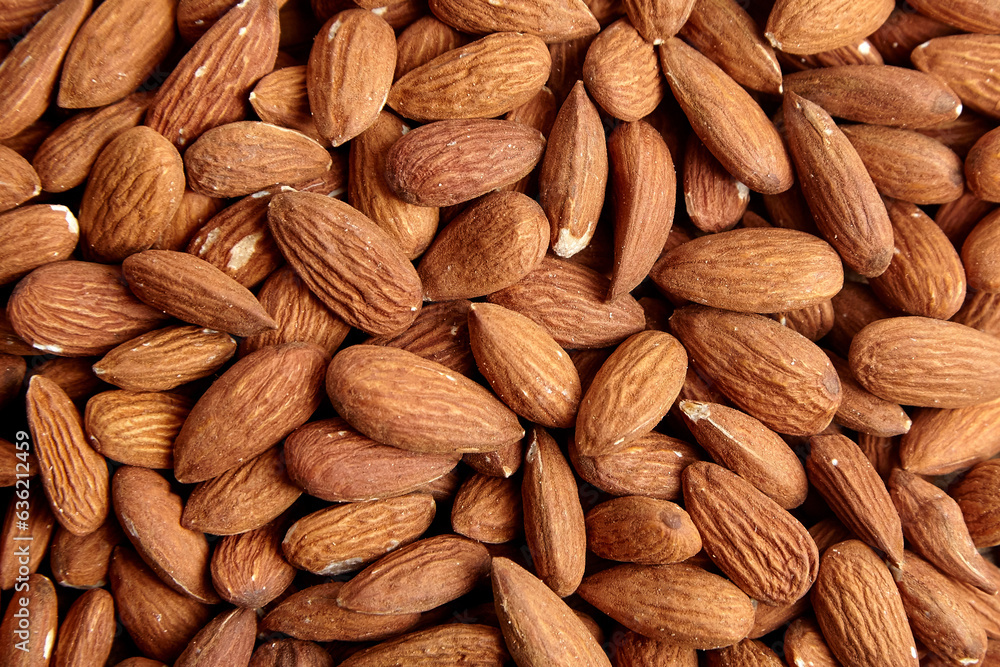 Almond nuts food texture background. Closeup of natural almond nuts Almond nuts food texture background. Closeup of natural almond nuts