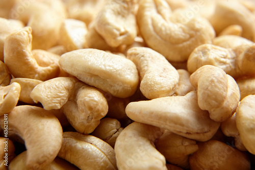 Cashew nut heap food texture background, macro shot. Nutritious and protein-rich