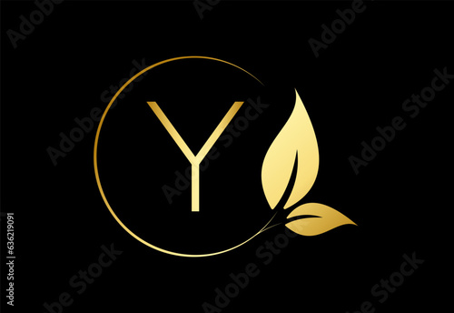 Initial monogram logo design Circles with leaves and letters