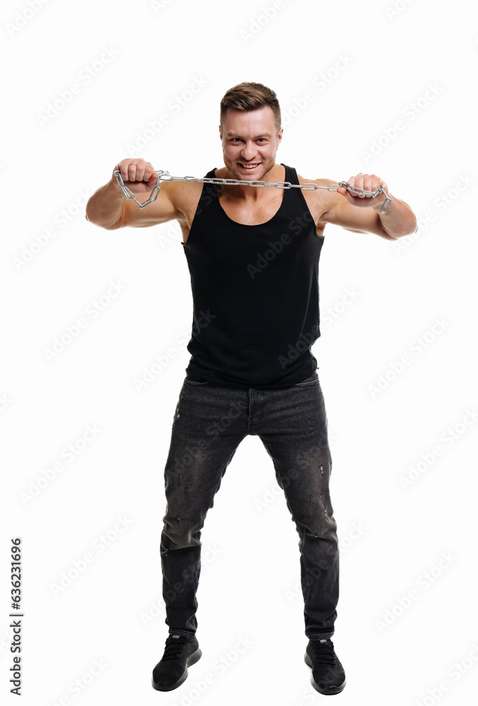 Muscular man pulling a chain on a white background. A man with a chain around his neck Muscular man pulling a chain on a white background. A man with a chain around his neck