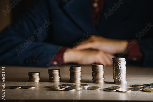 Money, Financial, Business Growth concept, Man's hand put money coins to stack of coins