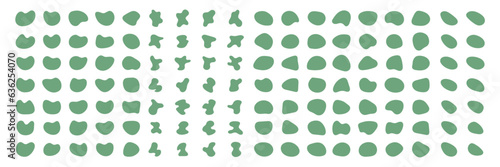 Abstract green irregular blot form. Random shapes of cube, pebble, inkblot, amoeba, drops and stone silhouettes. Blotch texture vector set