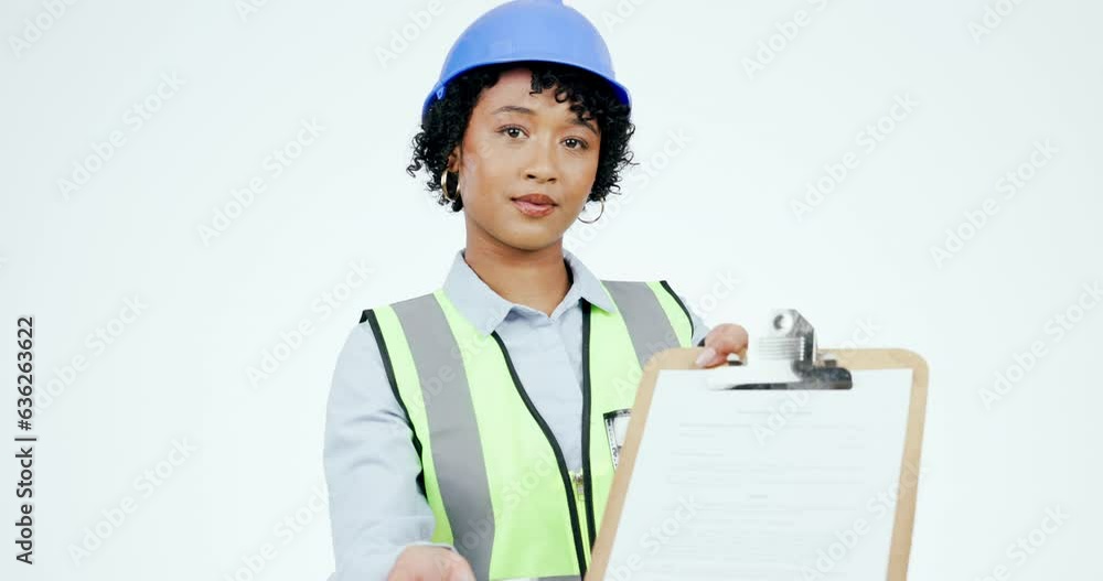 Engineer woman, checklist and writing in studio, documents and giving pen for signature by white background. Technician, architect or construction worker face with paperwork, contract and compliance Engineer woman, checklist and writing in studio, documents and giving pen for signature by white background. Technician, architect or construction worker face with paperwork, contract and compliance