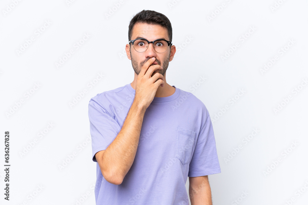 Young caucasian man isolated on white background surprised and shocked while looking right Young caucasian man isolated on white background surprised and shocked while looking right