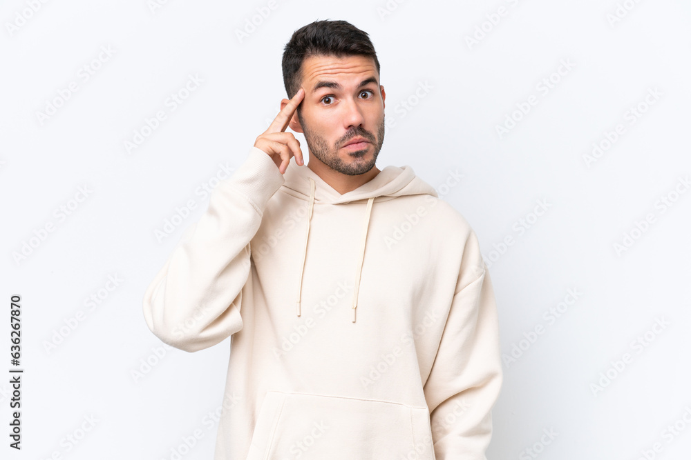Young caucasian man isolated on white background thinking an idea Young caucasian man isolated on white background thinking an idea